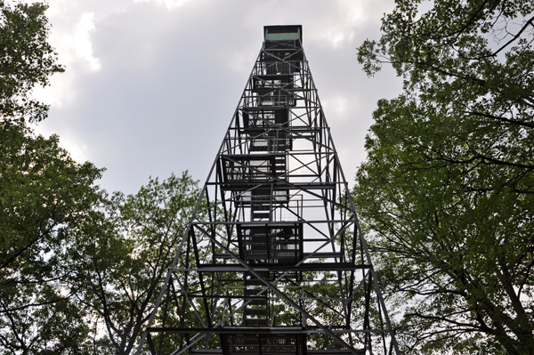 Karen Duquette climbing the Aiton Heights Fire Tower